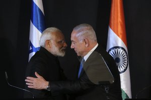 Indian Prime Minister Narendra Modi, left, shakes hands with Israeli Prime Minister Benjamin Netanyahu during their meeting at the King David hotel in Jerusalem, Wednesday, July 5, 2017.