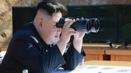 North Korean news shows what was said to be North Korean leader Kim Jong-un watching the launch of a Hwasong-14 ICBM.