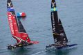 Neck-and-neck: New Zealand, left, competes against Sweden's Artemis Racing.