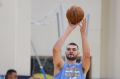 Australian centre Isaac Humphries shoots while working out for the Denver Nuggets.