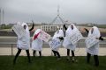 2015: Giant dancing tampons protest against the GST on sanitary products on the front lawn of Parliament House.