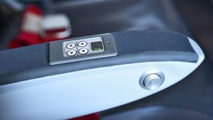 A 'secret button' is rumoured to give passengers in the aisle a little more room.