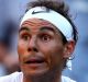 LONDON, ENGLAND - JULY 05: Rafael Nadal of Spain is given assistance during the Gentlemen's Singles second round match ...