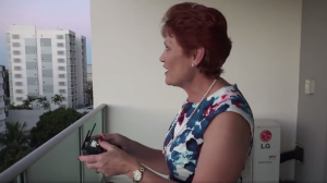 "You're probably wondering what I'm doing": Pauline Hanson flies a drone in Townsville on Wednesday.