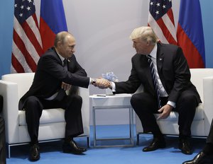 President Donald Trump meets with Russian President Vladimir Putin at the G20 Summit, Friday, July 7, 2017, in Hamburg. (AP Photo/Evan Vucci)