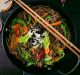 DO NOT USE HUffPOST Soba noodles with beef, carrots, onions and sweet peppers. Top view