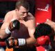 Jeff Horn and Manny Pacquiao trade blows in their WBO world welterweight title fight.