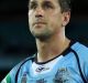 Scapegoat: Mitchell Pearce was dejected after full-time in game two.