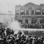 Police Assail Free Speech Protesters with Fire Hoses.