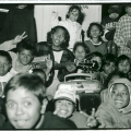 Alexandrino Da Costa, an East Timorese refugee, playing the guitar at the Puckapunyal Safe Haven. Photo by Ross Bird, 1999.