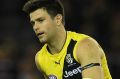 Tigers captain Trent Cotchin has gone on report for striking St Kilda's Jack Lonie.