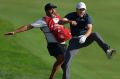 Master stroke: Jordan Spieth celebrates with caddie Michael Greller after Spieth holed a bunker shot on a playoff hole ...