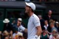 Andy Murray celebrates after winning against Fabio Fognini.