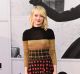 Actress Emma Stone poses at the 45th AFI Life Achievement Award Tribute to Diane Keaton, at Dolby Theatre on Thursday, ...