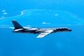 A Chinese H-6K bomber patrols the islands and reefs in the South China Sea.