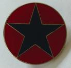 Black star on red enamel badge