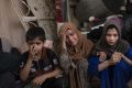 Fleeing Iraqi civilians. Iraqi police and army units have relied heavily on air strikes to make progress, but this has ...
