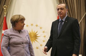 urkish President Recep Tayyip Erdogan, right, and German Chancellor Angela Merkel leave at the end of a press statement after a meeting in Ankara, Turkey, Thursday, Feb. 2, 2017.