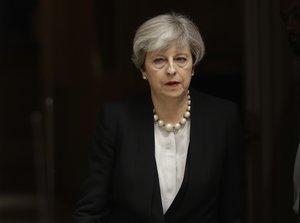 British Prime Minister Theresa May departs 10 Downing Street, London, to go to Manchester, Tuesday May 23, 2017. The day after an apparent suicide bomber attacked an Ariana Grande concert as it ended Monday night, killing over a dozen of people among a panicked crowd of young concertgoers.