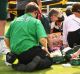 Bethanie Mattek-Sands receives treatment from the medical team after taking a horrific fall at Wimbledon.