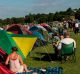 Tent city: Tennis fans queue by their tents in the public queueing zone outside the All England Tennis Club at Wimbledon.