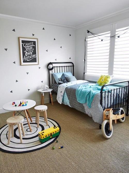 This is an example of a scandinavian gender-neutral kids' room in Sydney with white walls and carpet. — Houzz