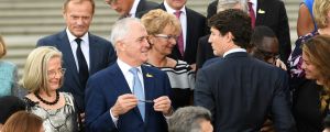 Prime Minister Malcolm Turnbull (centre) and his wife Lucy (left) speak to Canadian Prime Minister Justin Trudeau as ...