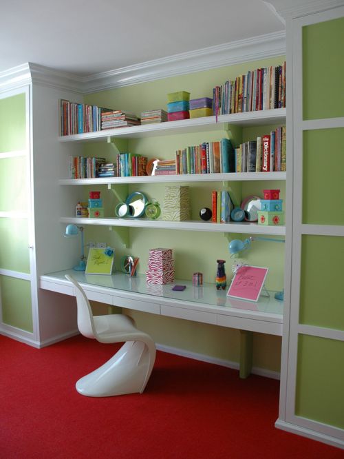 Photo of a small tropical gender-neutral kids' room in New York with green walls and carpet. — Houzz