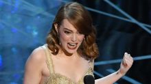 Emma Stone accepts the Oscar for best actress for <i>La La Land</i>.