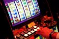 The government is reviewing how applications for poker machine increases are assessed.