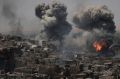 Air strikes target Islamic State positions on the edge of the Old City a day after Iraq's prime minister declared "total ...