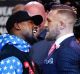 Fighters Floyd Mayweather jnr and Conor McGregor get up close and personal.