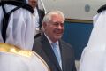 Qatari Ministry of Foreign Affairs officials welcome US Secretary of State Rex Tillerson to Doha on Tuesday.