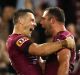 BRISBANE, AUSTRALIA - JULY 12: Cameron Smith and Cooper Cronk of the Maroons celebrate winning game three of the State ...