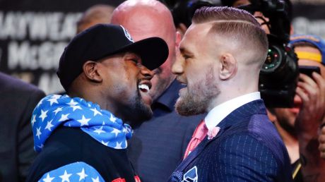 Fighters Floyd Mayweather jnr and Conor McGregor get up close and personal.