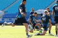 Boots and all: Andrew Fifita goes the toe at Blues training.