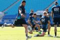 Sleeping giant: Andrew Fifita puts in the boot at Blues training.