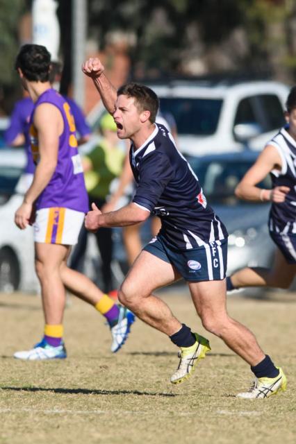 Matthew Young celebrates after kicking a goal for Hoppers Crossing on Saturday. (Shawn Smits)