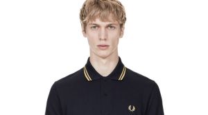 Fred Perry shirts are favoured by 'alt-right' offshoot The Proud Boys, who wear a black shirt with yellow trim as a ...