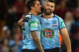 Game over: New South Wales players console each other following game three of State of Origin.