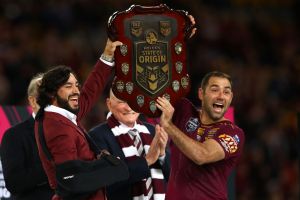 Just too good - again: Johnathan Thurston and Cameron Smith hold aloft the Origin trophy.