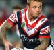 SYDNEY, AUSTRALIA - JULY 07: Jake Friend of the Roosters passes the ball during the round 18 NRL match between the ...