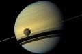 Saturn and its biggest moon Titan seen from NASA's Cassini spacecraft.