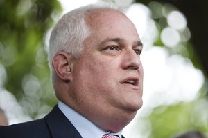 Matthew Weintraub, District Attorney for Bucks County, Pa., speaks with members of the media, Wednesday, July 12, 2017, in Solebury, Pa., as the search continues for four missing young Pennsylvania men feared to be the victims of foul play.