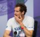 Britain's Andy Murray at a press conference after losing his Men's Singles Quarterfinal Match against Sam Querrey of the ...