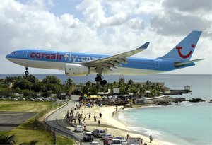 Corsairfly Airbus A330-200 on short final over Maho Beach. Princess Juliana International Airport (IATA: SXM, ICAO: TNCM) (also known as Saint Maarten International Airport) serves the Dutch part of the island of Sint Maarten.