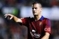 Strike power: Oriol Riera in action for Osasuna.