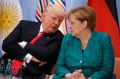 US President Donald Trump talks with German Chancellor Angela Merkel at the G20 Summit on Saturday.