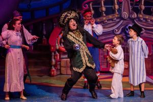 Todd McKenney as Captain Hook (centre) in the panto The Adventures of Peter Pan and Tinker Bell. 