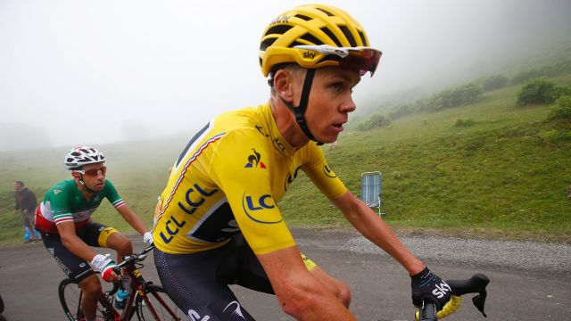 Chris Froome, right, and new overall leader Fabio Aru, climb Port de Bales pass during the twelfth stage.